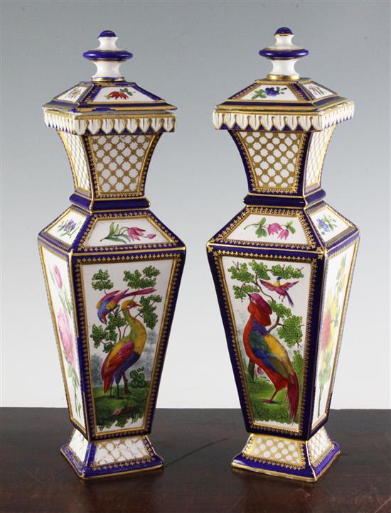A pair of Samson of Paris hexagonal baluster vases and covers, in Chelsea gold anchor style, 35cm, one cover chipped